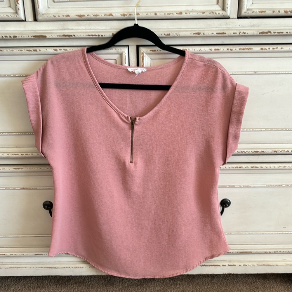 Pink blouse with functional zipper detail